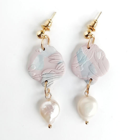 Blush Reverie - Soft pink with blue marbles