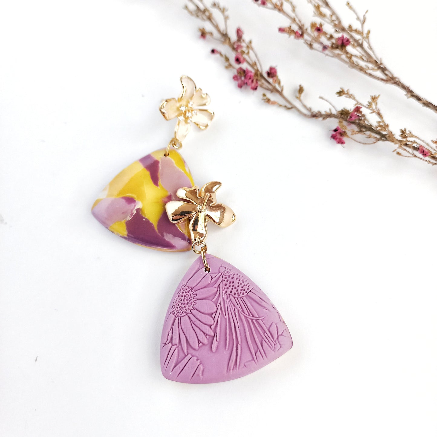 Whispered Marble - Medium triangle earring with cubic zirconia flower