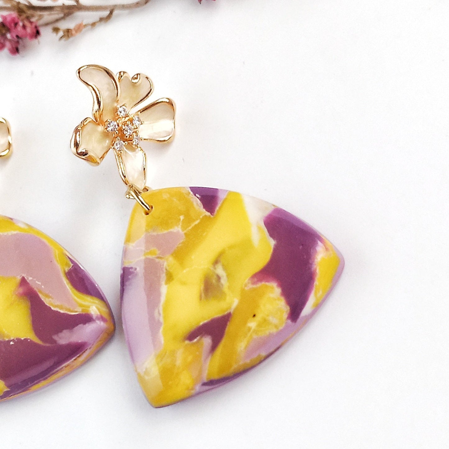 Whispered Marble - Medium triangle earring with cubic zirconia flower