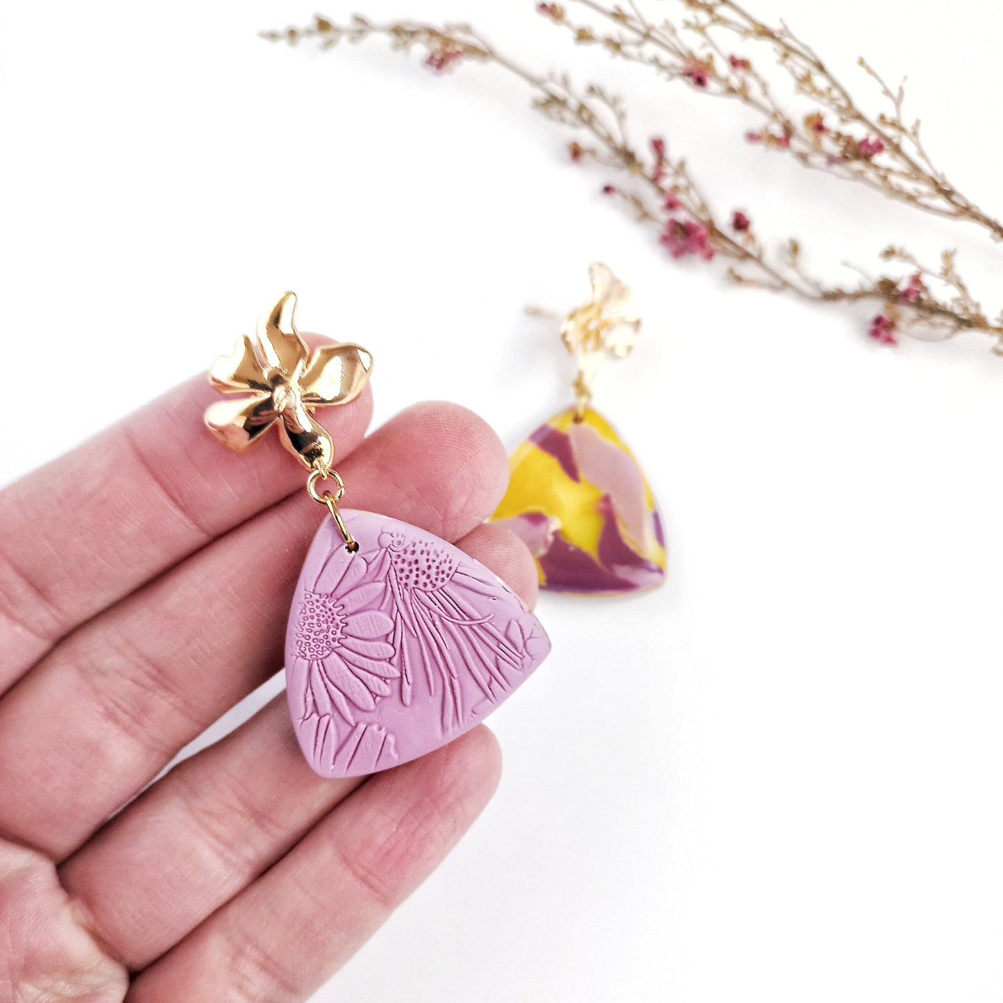 Whispered Marble - Medium triangle earring with cubic zirconia flower
